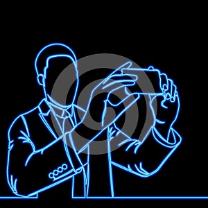 Man taking photo with smartphone icon neon glow concept