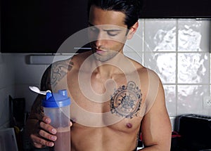 Man taking a protein shaker