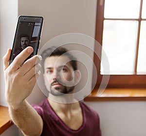 Man taking selfie.
