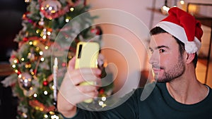 Man taking a selfie during Christmas time