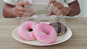 Man taking shots of food