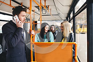 Man Talking on Cell Phone, public transportation