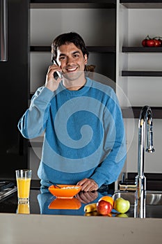 Man talking phone on breackfast