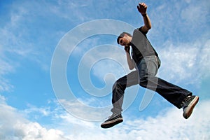 Man talking on phone midair photo