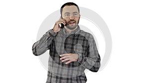 A man is talking on the phone and smiling on white background.