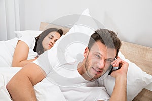 Man talking privately on cellphone