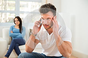 Man talking privately on cellphone