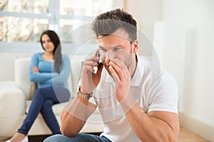 Man talking privately on cellphone