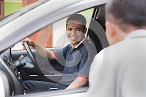 Man talking to car driver