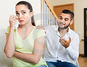 Man talking to upset woman