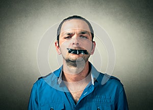 Man with the taped mouth