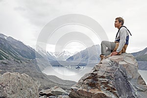 A man at Tasman Glacier viewpoint, Aoraki / Mount Cook National Park, New Zealand