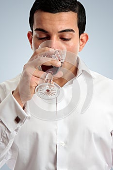 Man tasting drinking wine