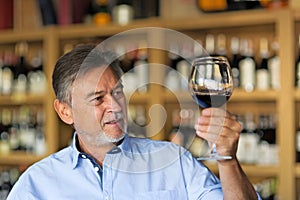 Man tasting wine photo