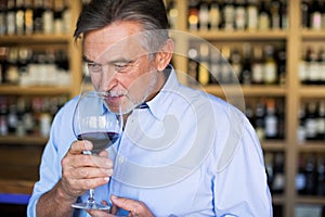 Man tasting wine photo