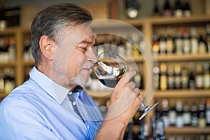 Man tasting wine photo