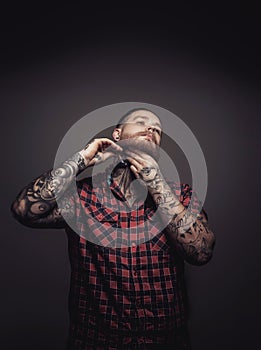 Man with tattoes and beard