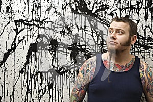 Man with tattoos.