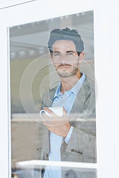 Man, tea and window with thinking of business ideas, brainstorming or reflection with insight and inspiration. Corporate