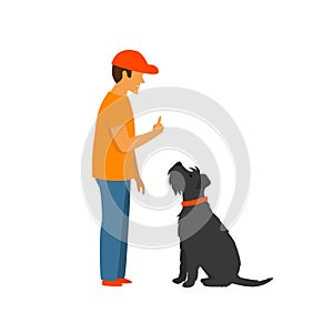 Man teaching a dog to stay and sit , basic commands obedience training photo
