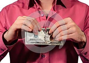 man tearing 20 US dollars banknotes isolated on a white