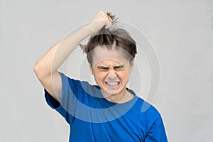 Man tearing his hair