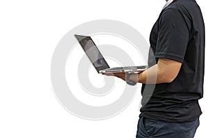 Man or technician standing on the side with holding computer laptop during enter command information data for operated work