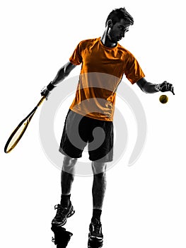 Man tennis player at service serving silhouette