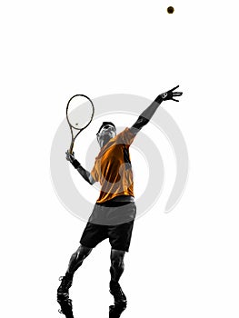 Man tennis player at service serving silhouette