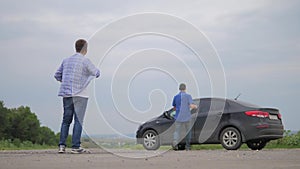Man test drive car.two men make deal. man seller driver makes car the auto insurance slow motion video sale sells used
