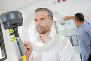 Man testing electrical equipment