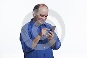 Man texting on his smartphone, horizontal