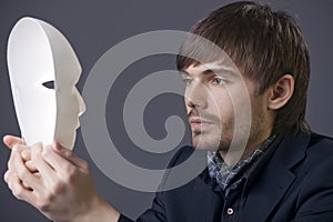 Man with theater mask