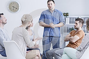 Man in therapy meeting