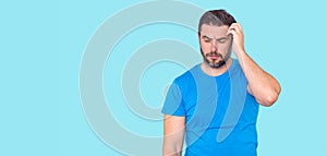 Man thinking with confuse face on isolated background. Man thinking about question, pensive expression. Thoughtful face. Doubt