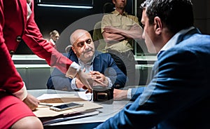Man thinking about his statement and the criminal charge during interrogation photo