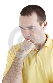 Man thinks his head resting on his hand