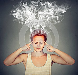 Man thinks very intensely having headache