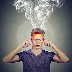 Man thinks very intensely having headache