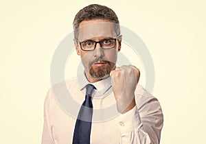 man threatening with fist isolated on white. man threatening with fist at studio.