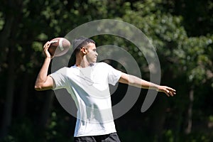 Man Throwing a Football photo