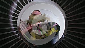 Man throwing unsorted trash, bottom view