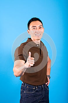 Man with thumbs up gesture signifying everything i