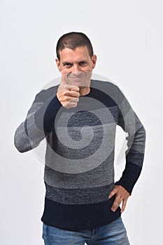 Man thumps up on white background