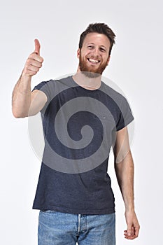 Man thumps up on white background