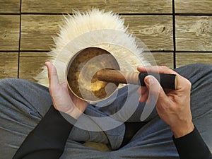 A man with a tibetan bowl