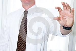 Man in Tie Holding Business Card