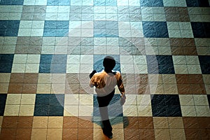 Man on Tile Floor