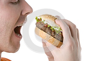 Man About To Bite Into A Cheeseburger