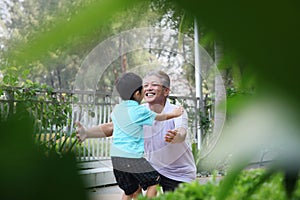 Man about to hug his grandson. Conceptual image